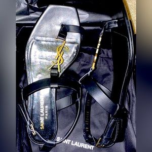 YVES SAINT LAURENT CASSANDRA FLAT SANDAL 100%CALFSKIN BLK~LEATHER/GOLD OFF-ICIER